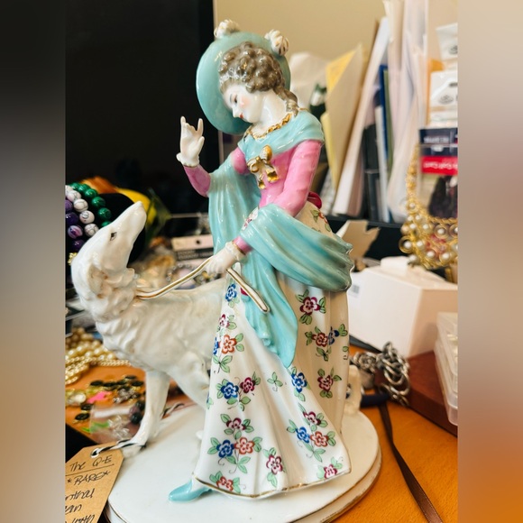 Beautiful figure of a lady walking her Borzoi - Picture 2 of 2